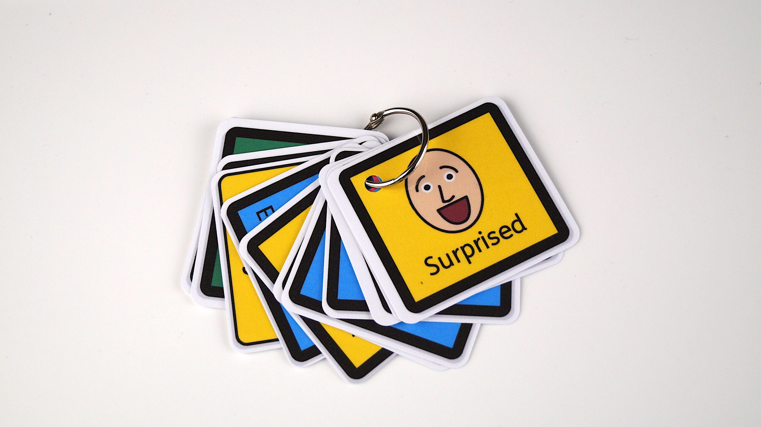 The I'm Feeling Lanyard helps children with ASD and learning disabilities express their emotions non-verbally using easy-to-read emotion cards.